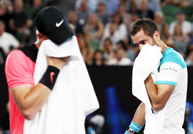 The heat took a toll on both, Kyle Edmund and Marin Cilic