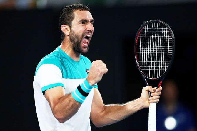 Croatia's Marin Cilic celebrates winning the second set in first semi-final of the Australian Open against Great Britain's Kyle Edmund in Melbourne on Thursday