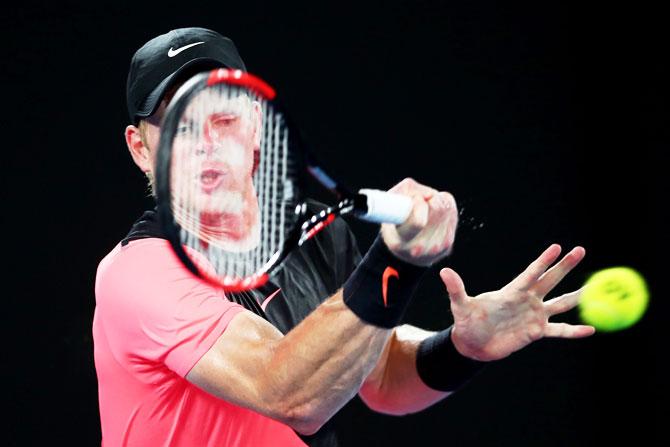 Kyle Edmund plays a forehand return in his semi-final against Marin Cilic