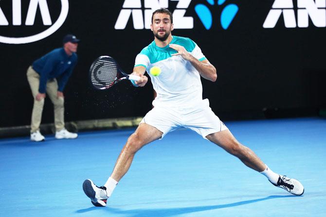 Marin Cilic blasts a forehand against Kyle Edmund