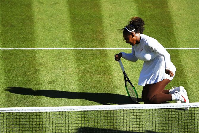 Serena Williams picks herself after slipping 