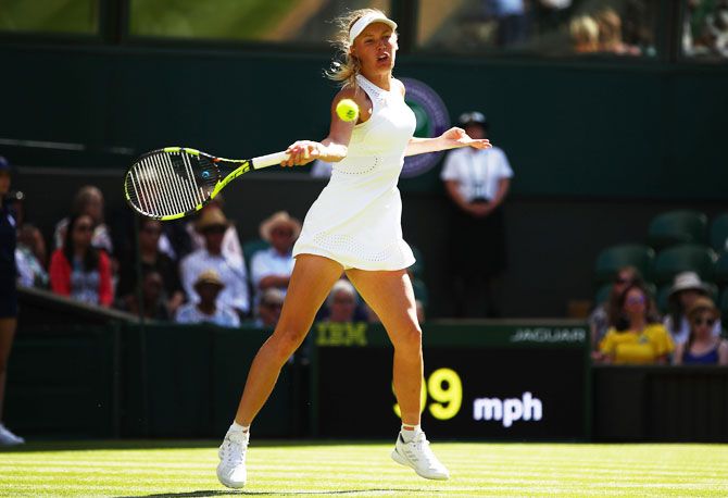 Denmark's Caroline Wozniacki plays a return against USA's Varvara Lepchenko 