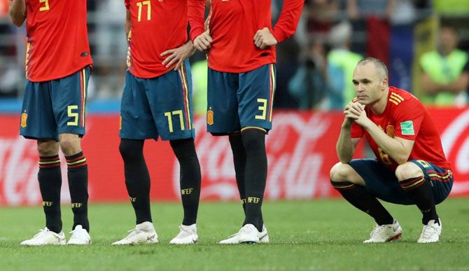 Spain's Andres Iniesta looks dejected after losing the penalty shootout against Russia on Sunday