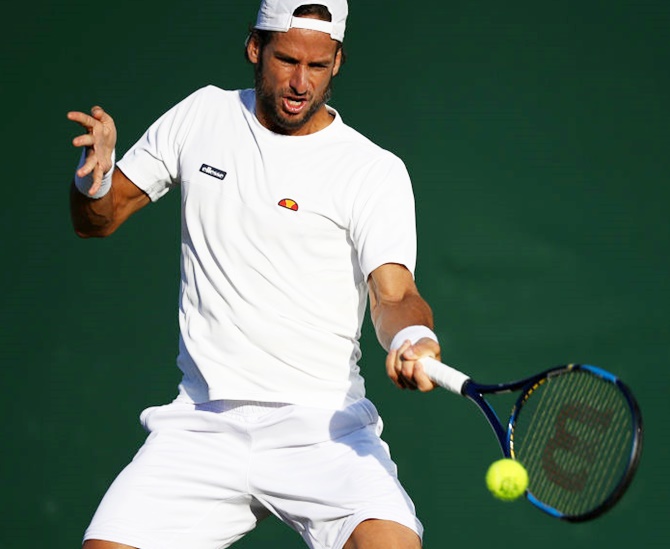 Feliciano Lopez of Spain plays a forehand