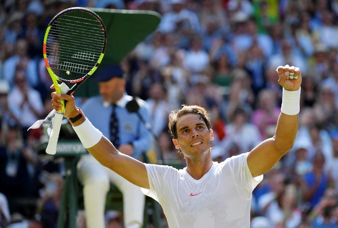 Spain's Rafael Nadal's celebrates winning his first round match against Israel's Dudi Sela