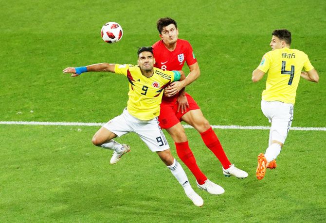 England's Harry Maguire in action with Colombia's Radamel Falcao