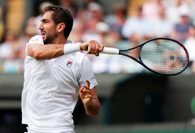 Croatia's Marin Cilic in action during his second round match against Argentina's Guido Pella