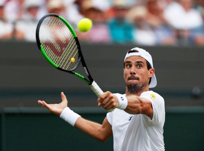 Argentina's Guido Pella in action during the second round match against Croatia's Marin Cilic