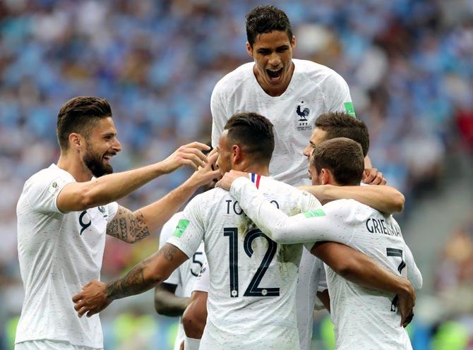 Antoine Griezmann of France celebrates with teammates 