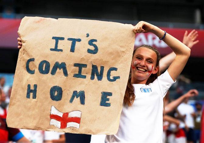 An England fan celebrates after the match at Samara Arena in Samara, Russia on Saturday