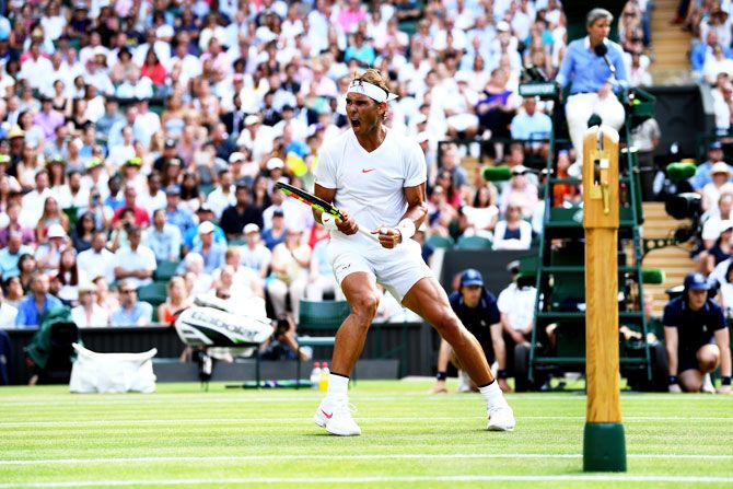 Spain's Rafael Nadal celebrates a point against the Czech Republic's Jiri Vesely during their fourth round match on day seven of the Wimbledon Lawn Tennis Championships at All England Lawn Tennis and Croquet Club in London on Monday
