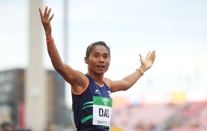 India's Hima Das celebrates winning gold in the final of the women's 400m on day three of The IAAF World U20 Championships in Tampere, Finland, on Thursday