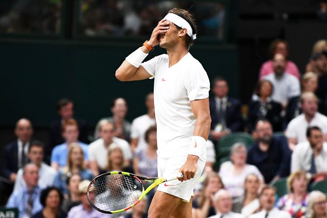Rafael Nadal reacts during his match against Novak Djokovic