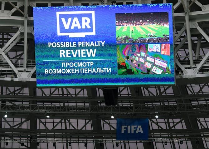 : The giantscreen announces a VAR review during the 2018 FIFA World Cup final between France and Croatia