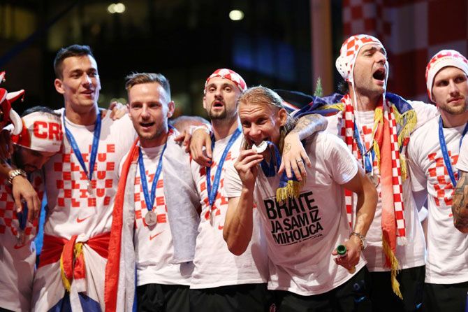 Croatia's Domagoj Vida and teammates on stage during celebrations