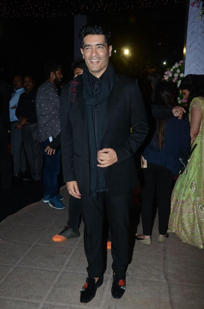 A-list fashion designer Manish Malhotra is all smiles