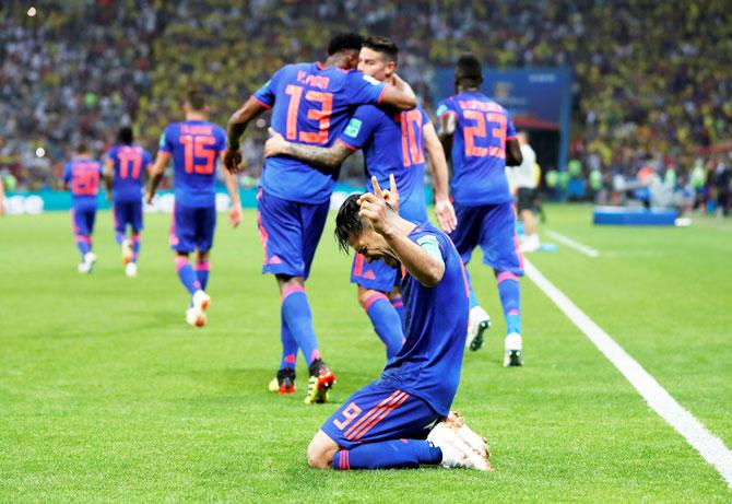 Colombia's Radamel Falcao celebrates scoring their second goal against Poland in their Group H match