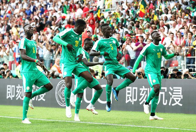 Senegal’s Mbaye Niang celebrates with teammates after scoring his team's second goal during their Group H match against Poland