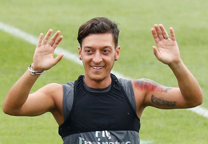 Arsenal's Mesut Ozil attends a training session in Singapore on Wednesday
