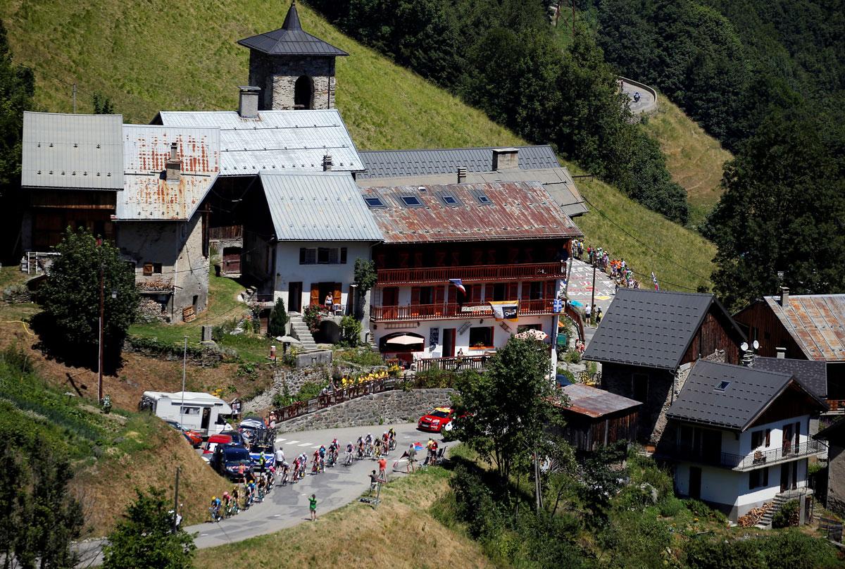 The pack of cyclists breakaway from the pack on a stretch at the 175.5-km Stage 12 from Bourg-Saint-Maurice Les Arcs to Alpe d’Huez on July 19