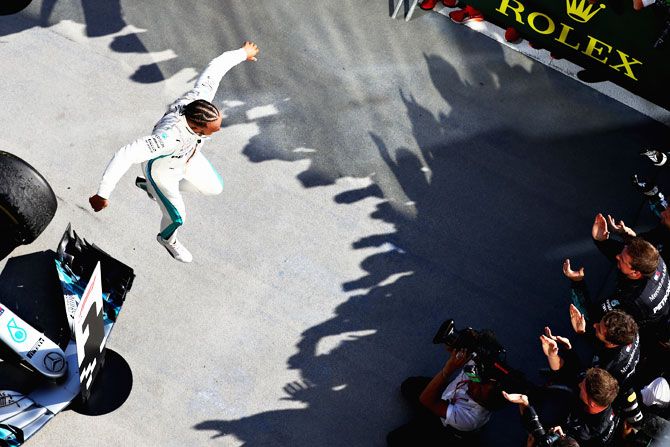 Race winner Lewis Hamilton of Great Britain and Mercedes GP celebrates in parc ferme after winning the Formula One Grand Prix of Hungary at Hungaroring in Budapest, Hungary, on Sunday