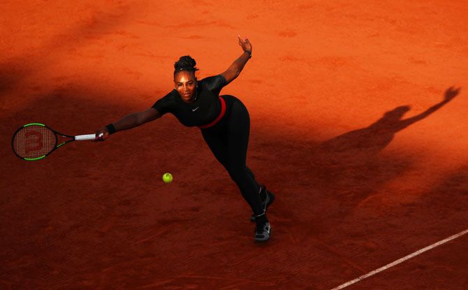 USA's Serena Williams plays a forehand return during her third round match against Germany's Julia Georges