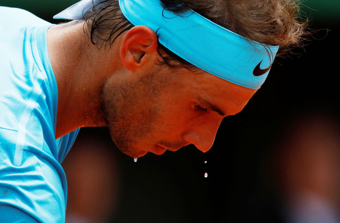 Rafael Nadal prepares to serve during his quarter-final against Diego Schwartzman on Thursday