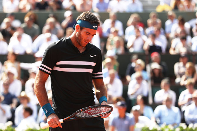 Argentina's Juan Martin Del Potro looks dejected