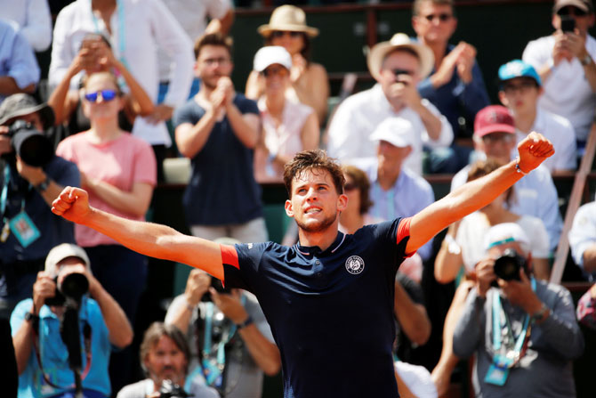 Austria's Dominic Thiem celebrates after winning his semi-final match against Italy's Marco Cecchinato