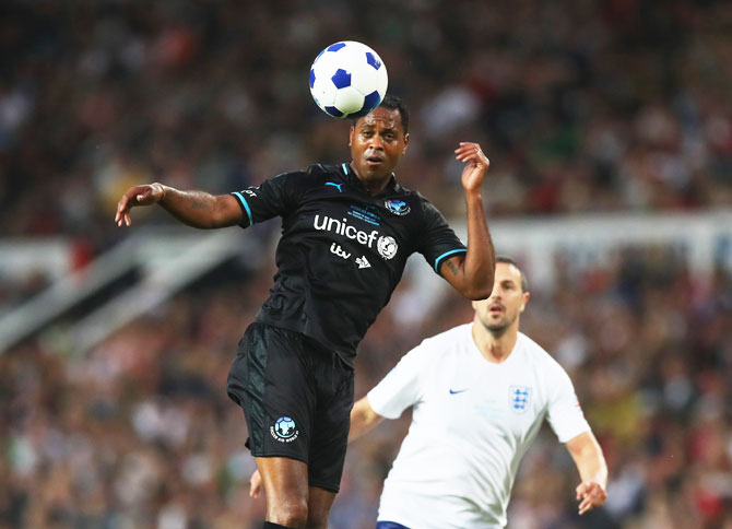World XI's Patrick Kluivert wins a header during the Soccer Aid for UNICEF 2018 match against England