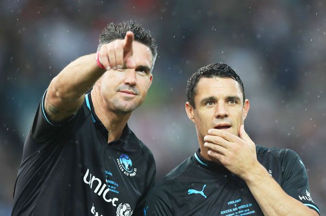 World XI's Kevin Pietersen and Dan Carter line-up prior to the Soccer Aid for UNICEF 2018 match