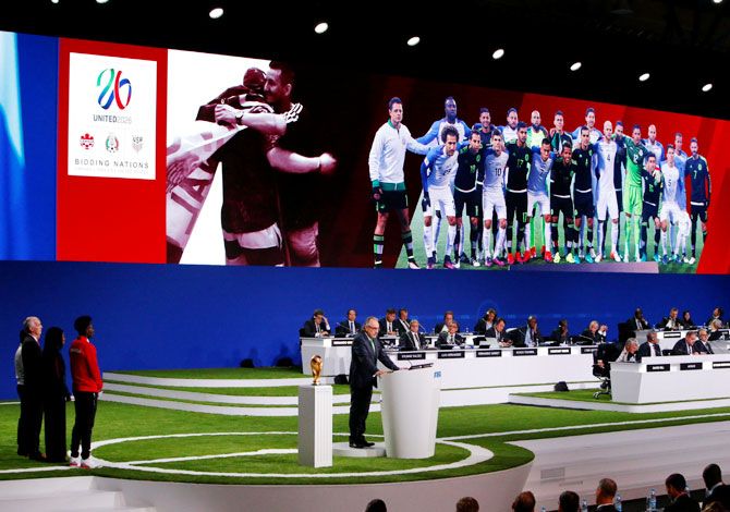 Delegates watch the presentation of the joint bid of United States, Canada and Mexico to host the 2026 FIFA World Cup during the 68th FIFA Congress in Moscow, on Wednesday