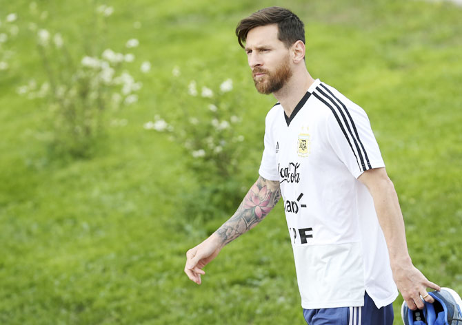Lionel Messi arrives at a Argentina training session on Tuesday