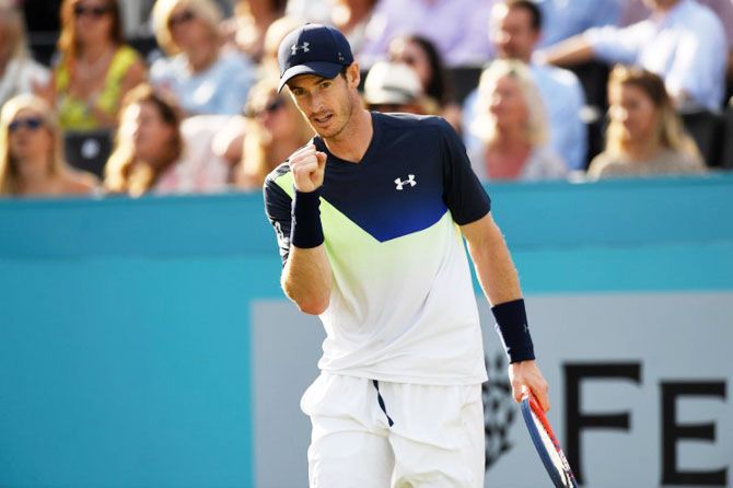 Britain's Andy Murray reacts during the Fever-Tree Championships first round match against Australia's Nick Kyrgios at The Queen's Club on Monday