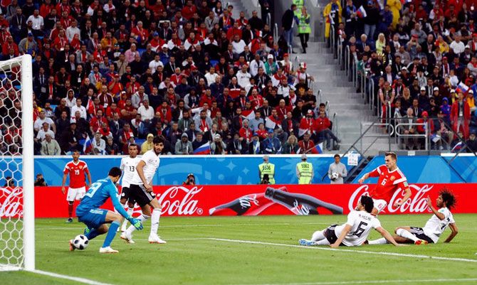 Russia's Denis Cheryshev scores their second goal against Egypt on Tuesday
