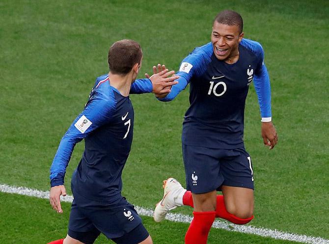 France's Kylian Mbappe celebrates with Antoine Griezmann after scoring against Peru at Ekaterinburg Arena, Yekaterinburg, on Thursday 