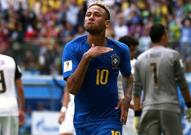 Neymar celebrates after scoring Brazil's second goal against Costa Rica in their Group E match