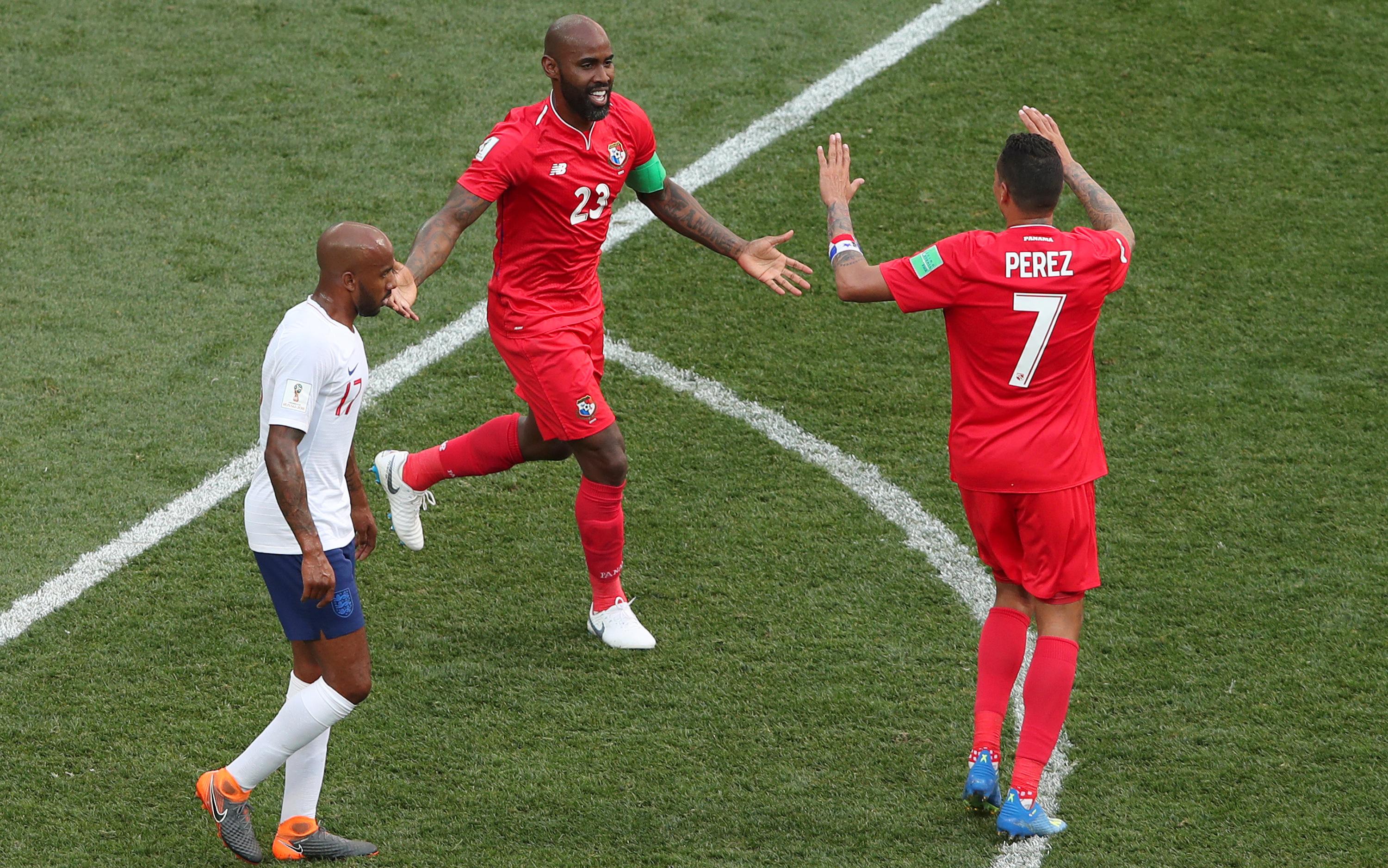 Panama's Felipe Baloy celebrates with teammate Blas Perez after scoring his team's first goal