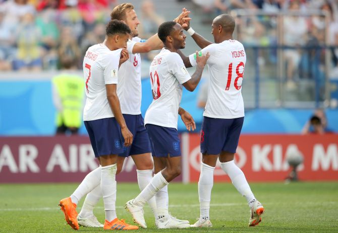 England's Harry Kane celebrates with teammates after scoring a hat-trick and his team's sixth goal