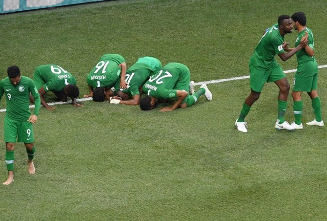 Saudi Arabia's Salem Aldawsari celebrates after scoring against Egypt in their Group A match