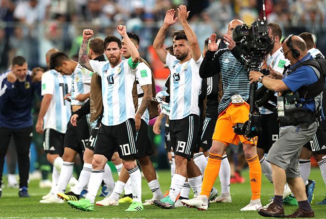 Lionel Messi and his Argentina teamnmtes celebrates following their win over Nigeria in their 2018 FIFA World Cup Russia group D match at Saint Petersburg Stadium in Saint Petersburg on Thursday