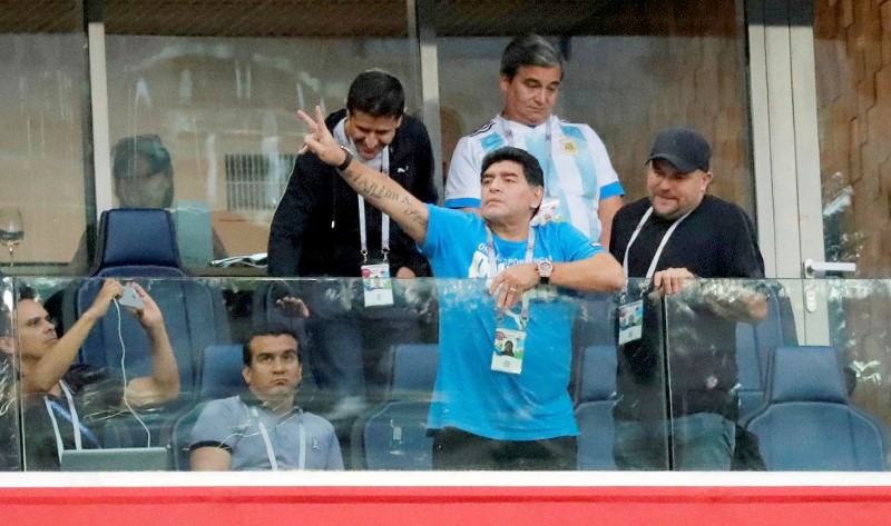 Diego Maradona watches the match between Argentina and Nigeria on Tuesday