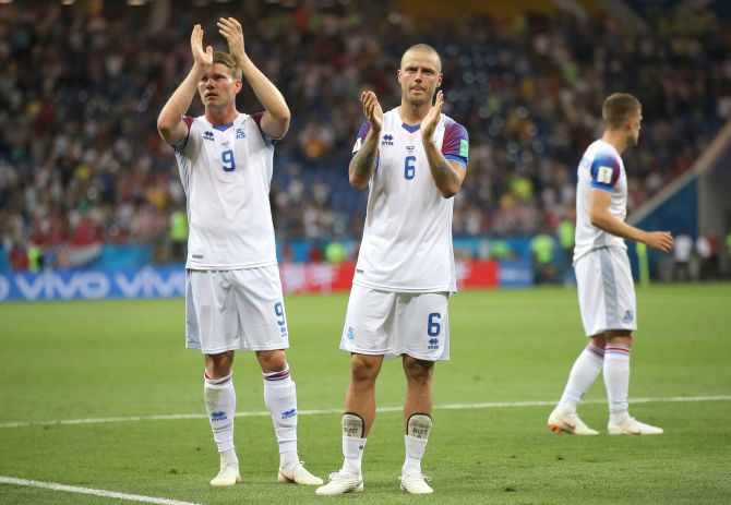 Iceland's Bjorn Sigurdarson and Ragnar Sigurdsson applaud fans after the 2018 FIFA World Cup Russia group D match against Croatia at Rostov Arena in Rostov-on-Don on Tuesday