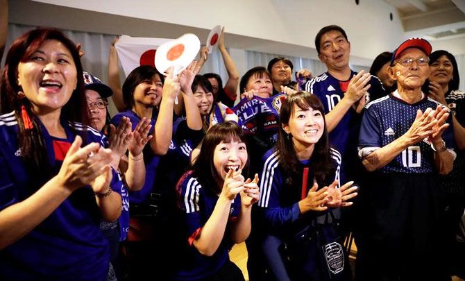 Fans react after the match at Japan House in Sao Paulo on Thursday