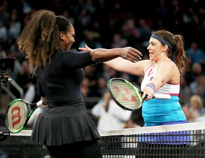 France's Marion Bartoli congratulates USA's Serena Williams after their exhibiton match during the Tie Break Tens at Madison Square Garden in New York City on Monday