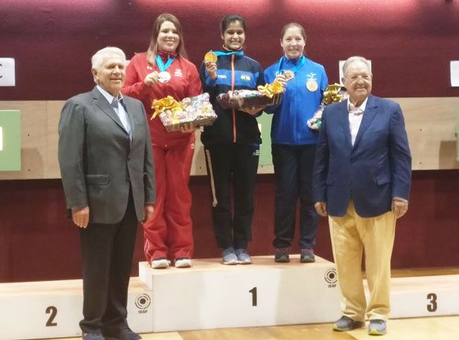 India's Manu Bhaker (centre) on the podium after winning a gold medal at ISSF World Cup in Guadalajara, Mexico on Sunday