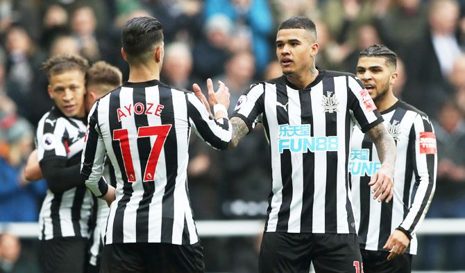 Newcastle United's Kenedy celebrates scoring their second goal with teammate Ayoze Perez