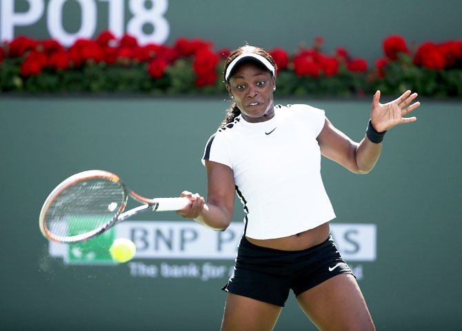 Sloane Stephens plays a forehand return  against Belarus' Victoria Azarenka