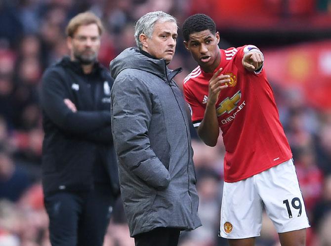 Manchester United's manager Jose Mourinho speaks to Marcus Rashford