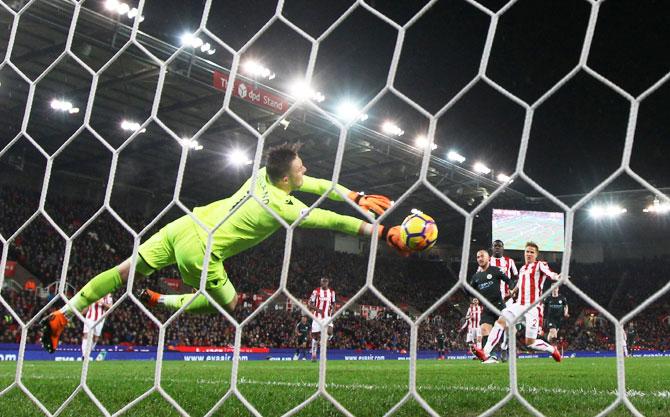 Manchester City's David Silva scores their first goal against Stoke City  Soccer Football - Premier League - Stoke City vs Manchester City - bet365 Stadium, Stoke-on-Trent on Monday